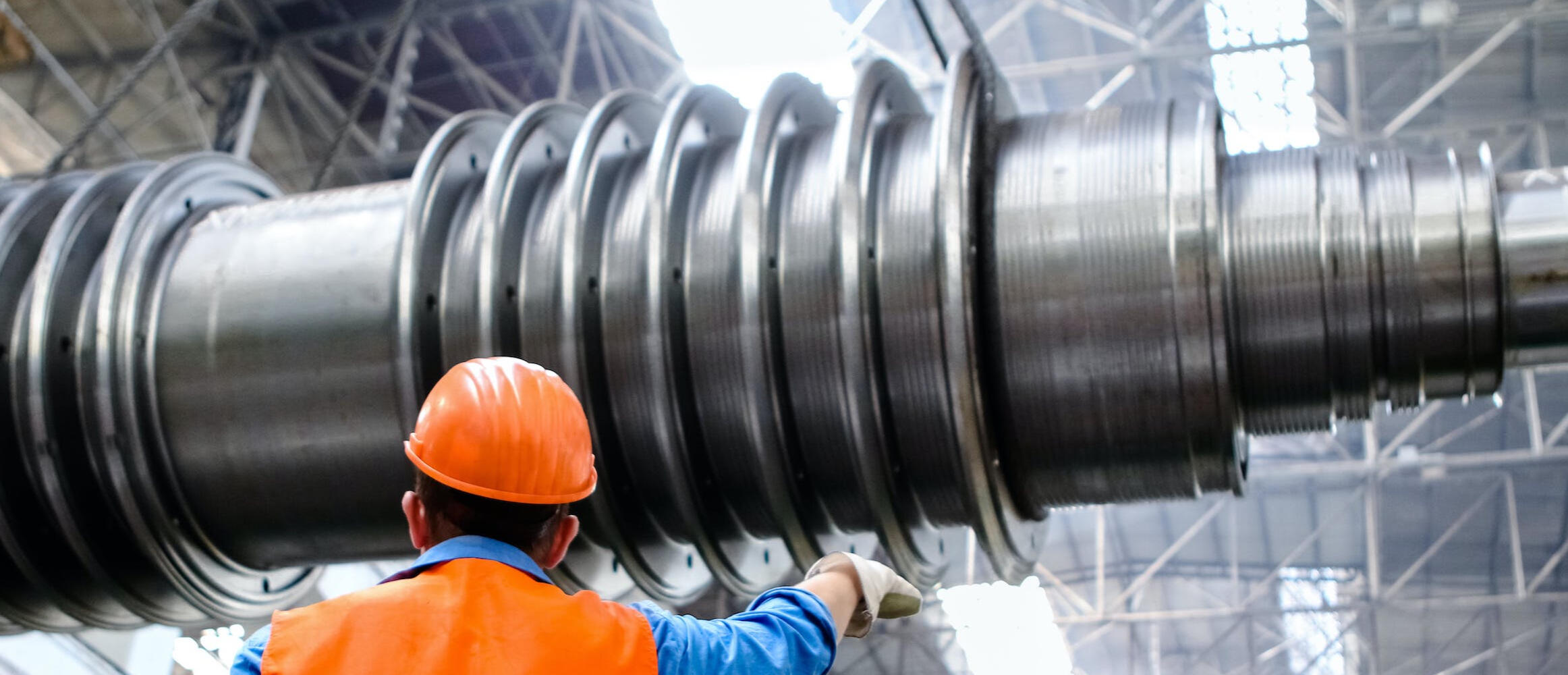 Very large pipe being moved in warehouse